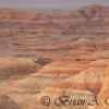 Badlands With Fog In The Distance