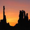 First Light Close-Up on Totem Pole and Yei-Bi-Chi - Monument Valley