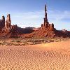 Totem Pole and Sand Dunes - Monument Valley