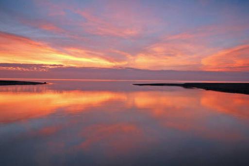 Sunrise on the Pike River and Lake Michigan